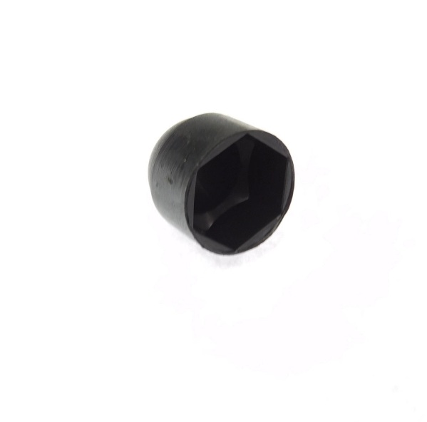 Small black hex socket plug with an internal hex recess visible from the opening